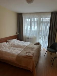 Ένα ή περισσότερα κρεβάτια σε δωμάτιο στο Apartment in Castle 1