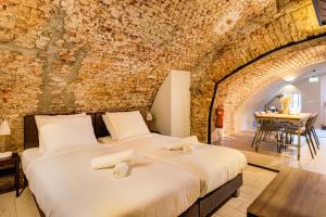 Ένα ή περισσότερα κρεβάτια σε δωμάτιο στο 2 Luxurious canal apartments in Utrecht