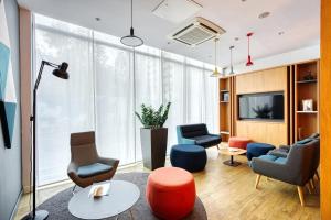 Гостиная зона в Holiday Inn Express - Almaty by IHG