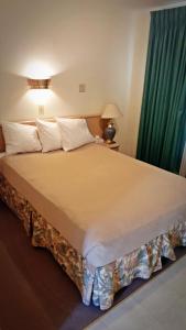 Postel nebo postele na pokoji v ubytování Badlands Motel