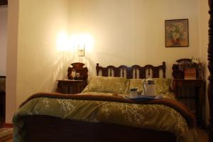 Postel nebo postele na pokoji v ubytování Hacienda La Merced Baja