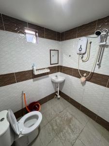 Ένα μπάνιο στο Wika Homestay +8 φωτογραφίες