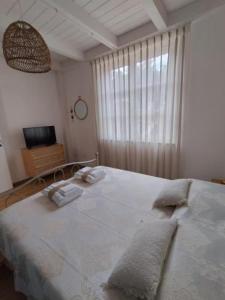 Ένα ή περισσότερα κρεβάτια σε δωμάτιο στο Agriturismo Frutti Antichi - Cassiopea +8 φωτογραφίες