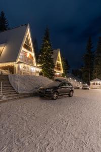 Двоповерховий апартамент у котеджі Freeman-4b з альтанкою та грилем v zimě