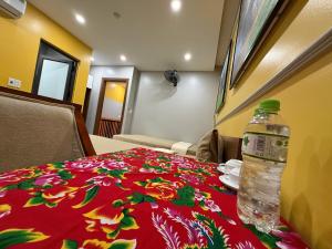 Postel nebo postele na pokoji v ubytování Ha Giang City Hotel