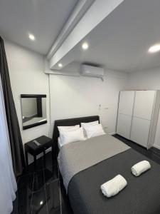 Una cama o camas en una habitación de Sarajevo Center Point