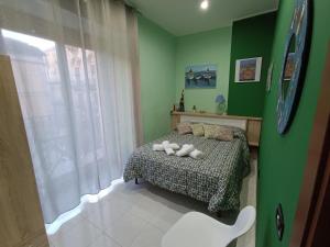 A bed or beds in a room at Casa Emanuele