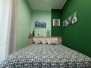 A bed or beds in a room at Casa Emanuele