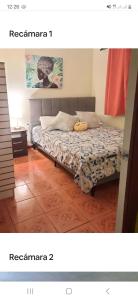 a bedroom with a bed with a pumpkin on it at Casa 3 dormitorios para 15 o más personas in El Quisco