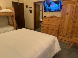 Postel nebo postele na pokoji v ubytování Hotel Firenze