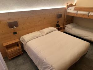 Postel nebo postele na pokoji v ubytování Hotel Firenze