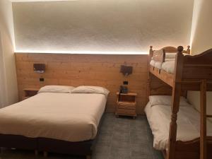 Postel nebo postele na pokoji v ubytování Hotel Firenze