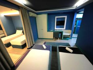 Postel nebo postele na pokoji v ubytování New W Hotel
