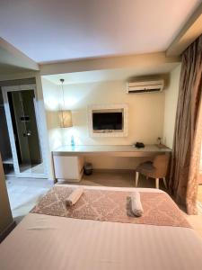 TV a/nebo společenská místnost v ubytování New W Hotel