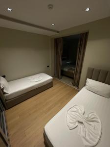 Postel nebo postele na pokoji v ubytování New W Hotel