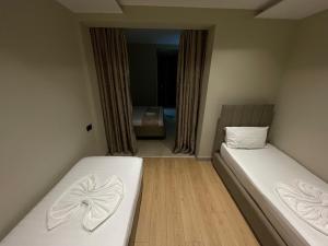 Postel nebo postele na pokoji v ubytování New W Hotel