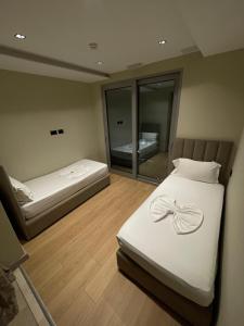 Postel nebo postele na pokoji v ubytování New W Hotel