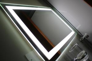a glass door with a light coming through it at Hostal Cieza in Chiclayo