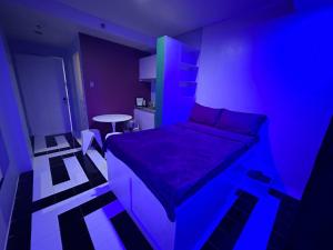 Ένα ή περισσότερα κρεβάτια σε δωμάτιο στο Baguio Equinoxx Homestay