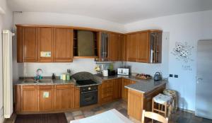 Kuchyň nebo kuchyňský kout v ubytování Grandi Cime Guest House