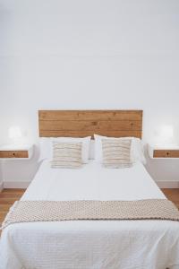 Posteľ alebo postele v izbe v ubytovaní Hotel Posada del Mar