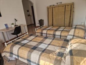 Postel nebo postele na pokoji v ubytování Elisa Adda House