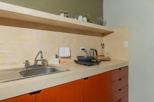 Kuchyň nebo kuchyňský kout v ubytování Hotel Poquito a Poquito