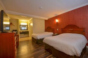 Cama o camas de una habitación en Hollywood City Inn