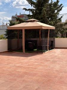 Patio nebo venkovní prostory v ubytování Άνετο διαμέρισμα - Κέντρο Ξάνθης