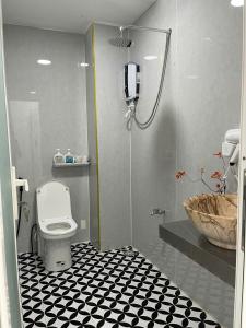 Koupelna v ubytování Ann Home