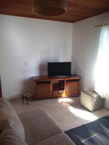 Μια τηλεόραση ή/και κέντρο ψυχαγωγίας στο Casa aconchego da serra