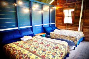 Ch'i Bocól Community Hostel客房内的一张或多张床位