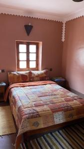Postel nebo postele na pokoji v ubytování Riad Bouchahoud Hotel in Telouet
