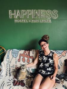 Domácí mazlíčci ubytovaní s hosty v ubytování Happiness Hostel