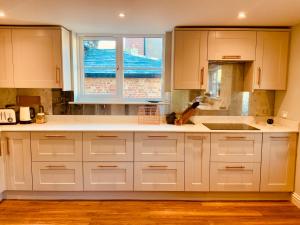 Kuchyň nebo kuchyňský kout v ubytování The Old Coach House + 1 fotografie