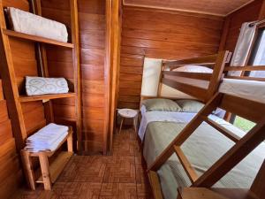 Postel nebo postele na pokoji v ubytování Vista Lapas Cottage + 8 fotografií