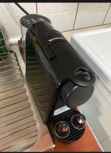 a black mixer sitting on top of a table at Λιέγη Orestiada apartment no 2 in Orestiada