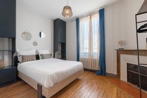 Ένα ή περισσότερα κρεβάτια σε δωμάτιο στο MAISON AMPERE +5 φωτογραφίες