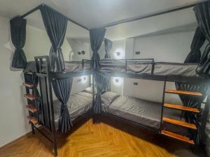 Postel nebo postele na pokoji v ubytování Nordic Hostel & Gym l Female Only