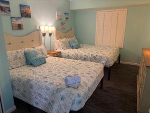 Postel nebo postele na pokoji v ubytování Ocean Walk Resort - Breathtaking Ocean Front View + 50 fotografií