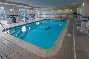 a swimming pool in a hotel room at Fairfield Inn & Suites Toledo North in Toledo