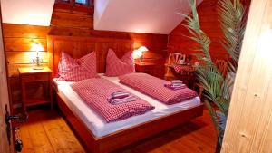 Postel nebo postele na pokoji v ubytování Sonnleit'n Zimmer 2