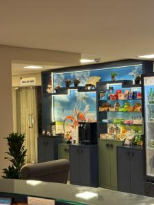 TV a/nebo společenská místnost v ubytování Hotel Imperatriz