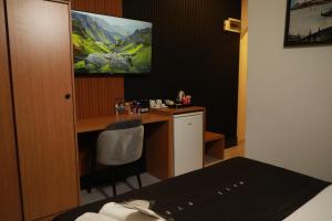 A bed or beds in a room at Istanbul Bakirkoy Rays Port Hotel City Center