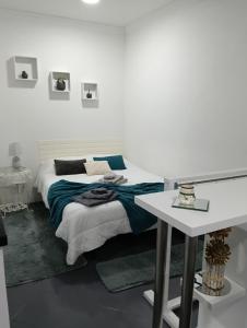 Кровать или кровати в номере O aconchego