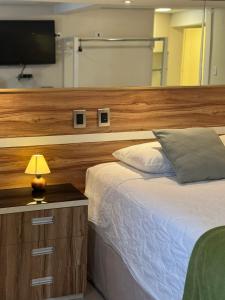 Postel nebo postele na pokoji v ubytování Hotel Imperatriz
