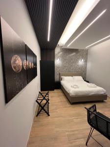 Eterna Suites Roma客房内的一张或多张床位