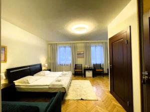Posteľ alebo postele v izbe v ubytovaní Hotel Beskid