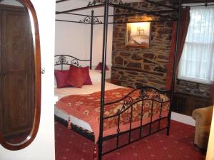 Кровать или кровати в номере Townstal Farmhouse