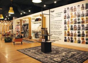 a store with a large wall with photographs on it at Upscale Apartment Suite - Close to Everything in Spokane